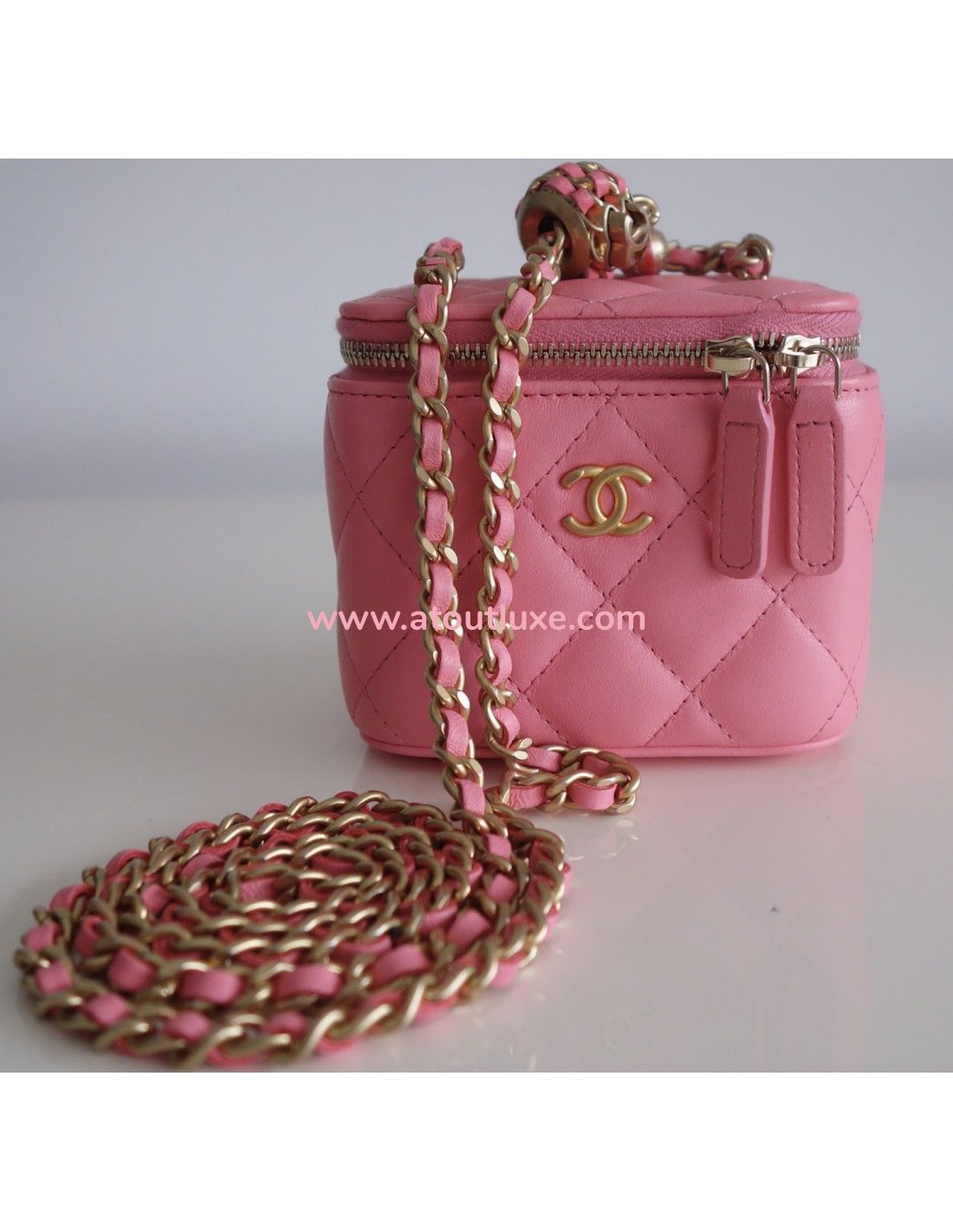 sac pochette chanel trousse en cuir matelasse