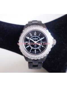 Montre Chanel J12 noire...